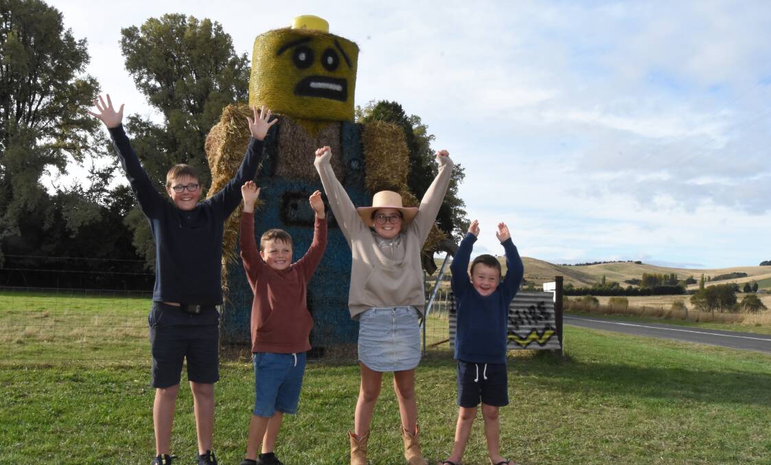 Ayden, Freddy, Cortnee and Kohen Pixton with their winning entry in the Hay Bale section of the Sculptures by the Bush competition. This was the family's first entry.