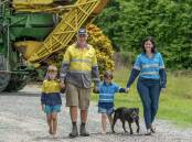 SMART FARMING: Michael and Liza Giudice, with children Flynn and Zara and the family pooch, are at the forefront of sustainable farming in Far North Queensland.