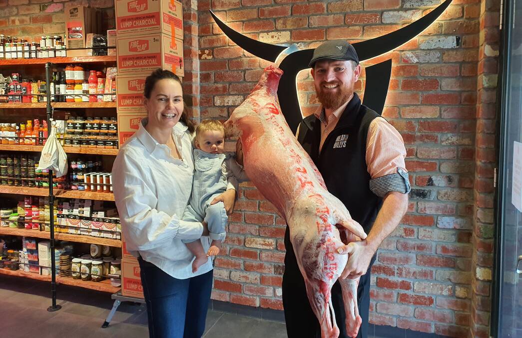 HAPPY TO SERVE: Sophie Curtis and Daphne catch up with Brad Strudwick at Meat at Billy's which sells Bellevue Dorper lamb.