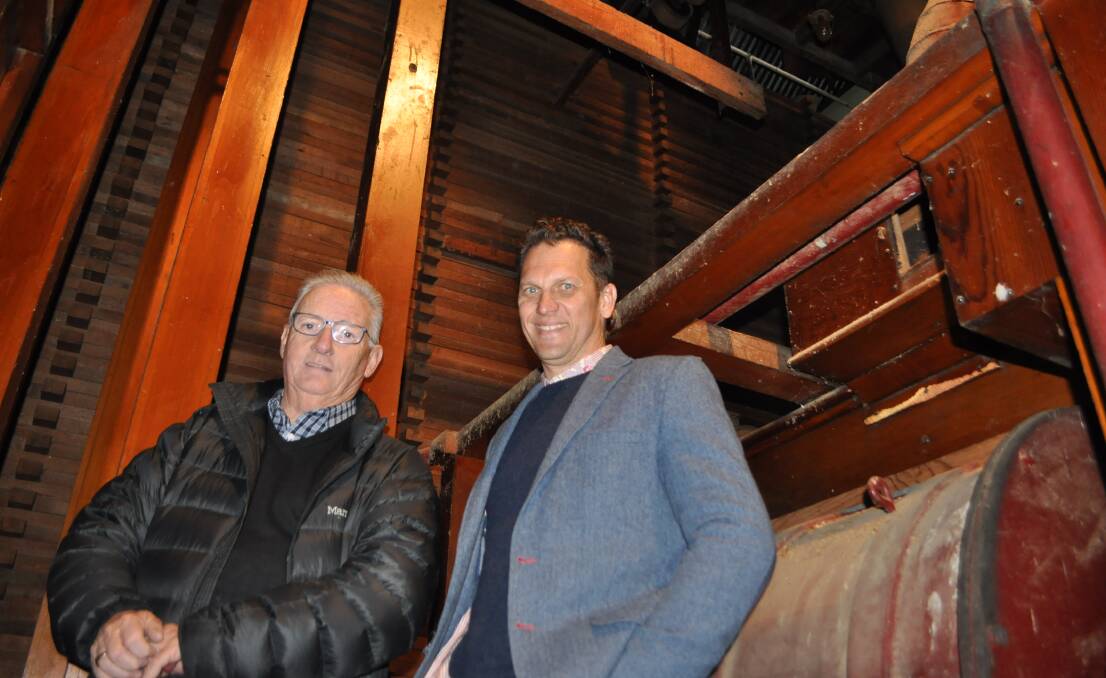 Owner Stephen Birrell and Councillor Jess Jennings pictured inside the historic Tremain's mill.
