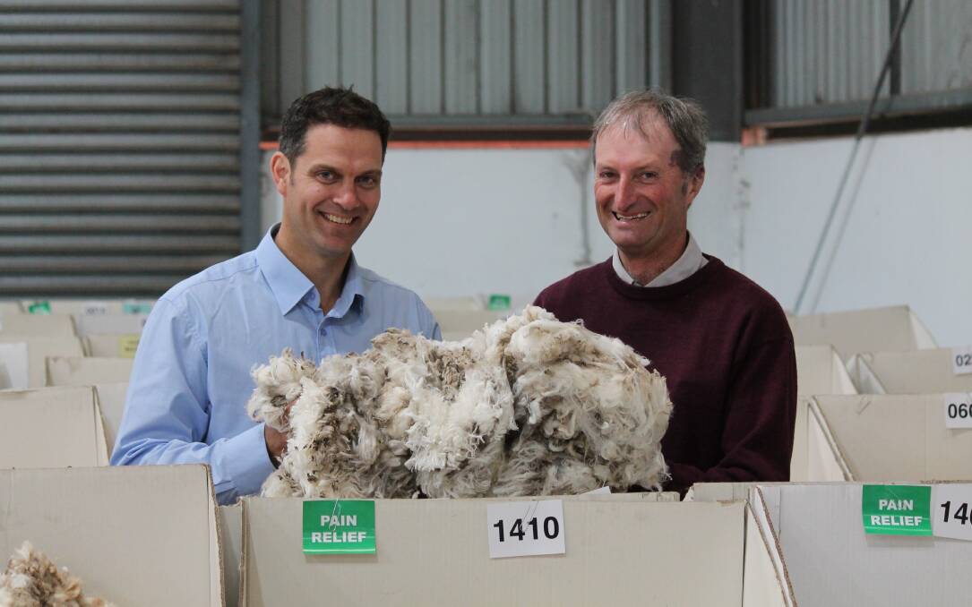 Alister Carr, Karee Wool, with client James Sexton, Jamar Park, Goornong, Vic, who sold 49 bales of 15-17m wool recently. 