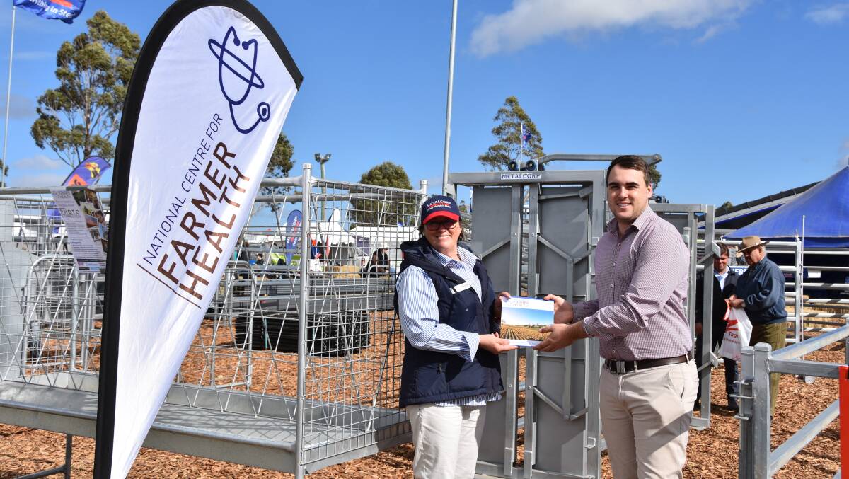 Olivia Pronk, National Centre for Farmer Health and Metalcorp's Paul Bidmeade at FarmFest near Toowoomba last month.