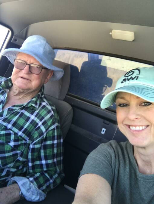 Kristen with her father on a recent drive around their farm. 
