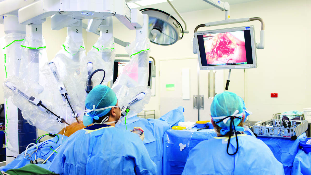 Medical professionals using robotics during surgery at the Ramsay Health Care-operated Greenslopes Private Hospital in Brisbane. Ramsay Health Care has lifted full-year net profit across the company's Australian business.