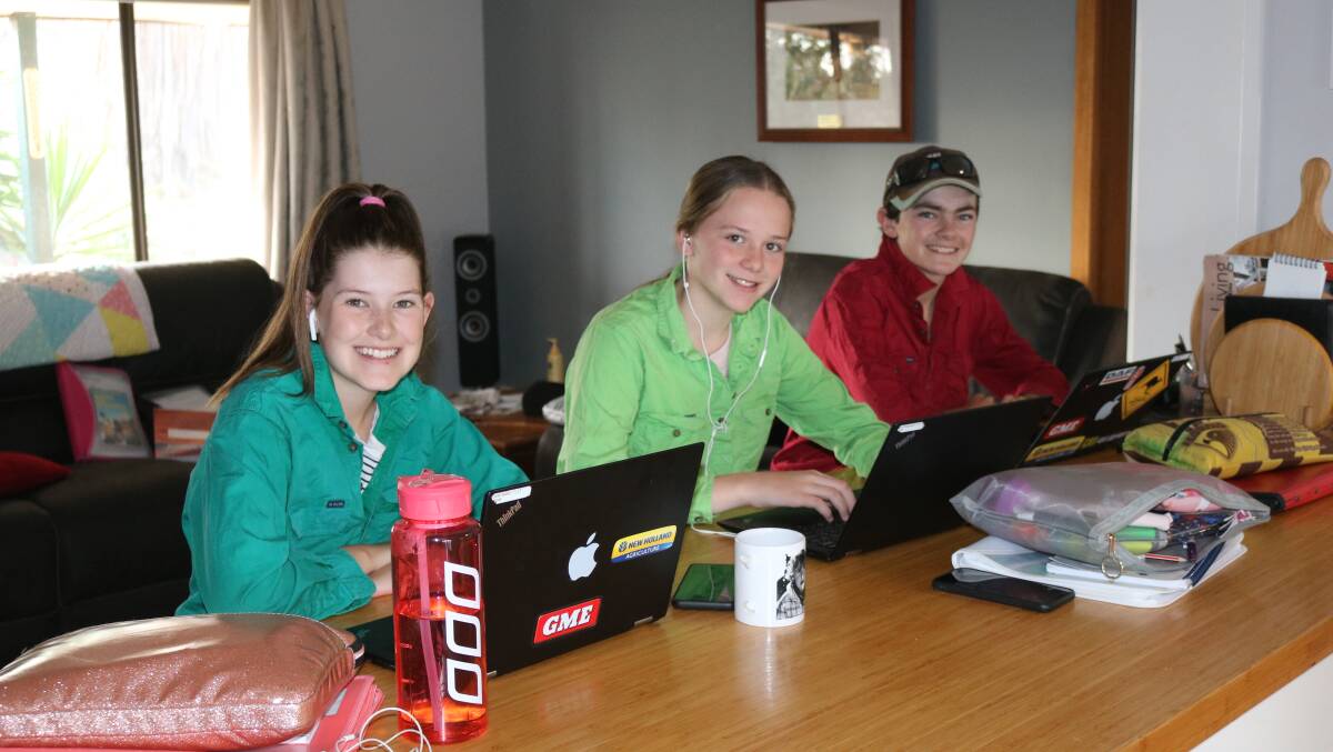 Larah Butler, Skye Fitzgerald and Liam Butler, all home from school connecting online at Balranald. Photo: Claire Butler