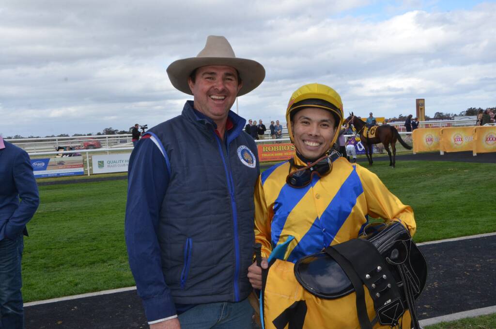 Leading Southern Districts trainer, Trevor Sutherland with the well-travelled hoop Allan Chau after taking the Aggies Cup with Run Hoff Run at Wagga Wagga last Saturday.  Photos by Virginia Harvey. 