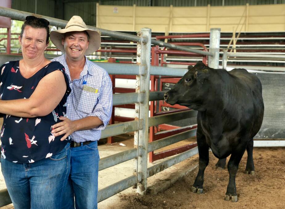 Rebecca and Darren Sutherland with this year's bullock, weighing 850kg, that went under the hammer for $2092.70. Photo by Samantha Townsend.