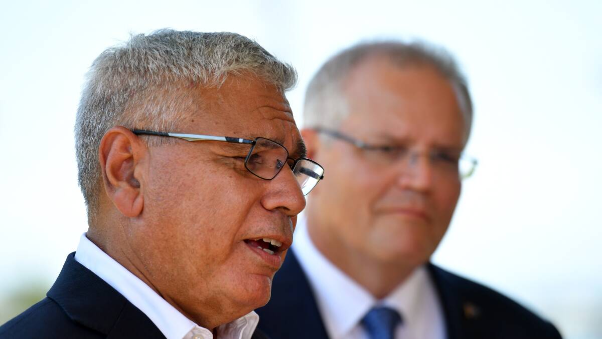 Liberal candidate for Gilmore Warren Mundine and Prime Minister Scott Morrison at a press conference at the Nowra Golf Club in Nowra, on January 23, 2019. The Liberal party has announced former ALP president Warren Mundine as its candidate for Gilmore. (AAP Image/Mick Tsikas)