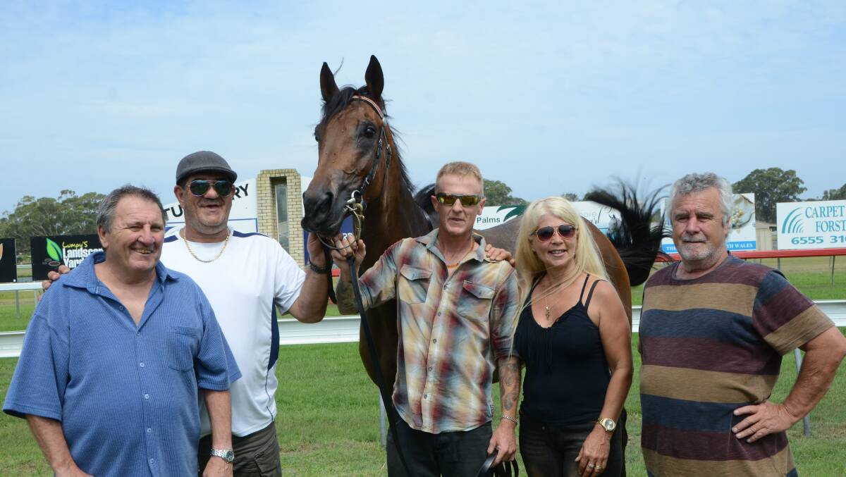 Part owners Ray Keightley and John Morton (far right) flank Gosford trainer Jim Louizos and wife Freda with Danzibar Dancer and strapper Matt Hepworth.