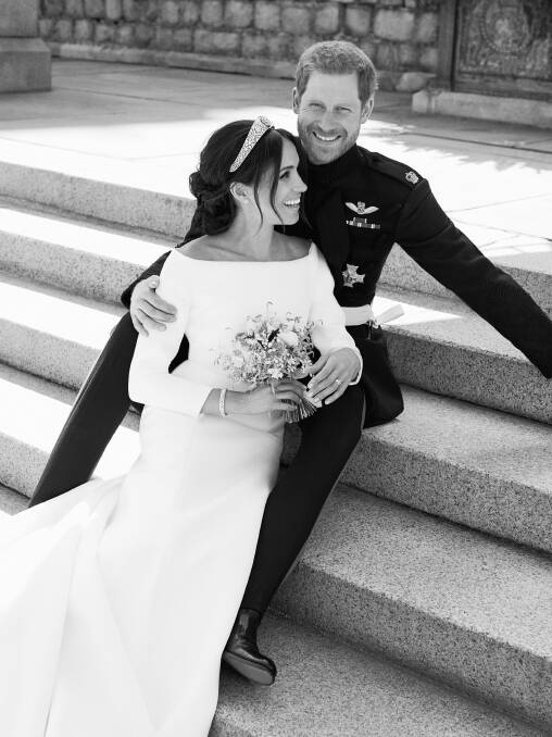 This photo released by Kensington Palace is an official wedding photo of Britain's Prince Harry and Meghan Markle, on the East Terrace of Windsor Castle.