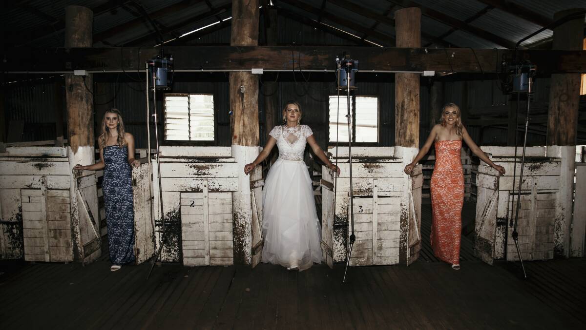Bride Cassie Dorrstein with her bridesmaids Bonnie Hayne and Mayah Bourke-Tindal. Photo: Jaymee Solomon