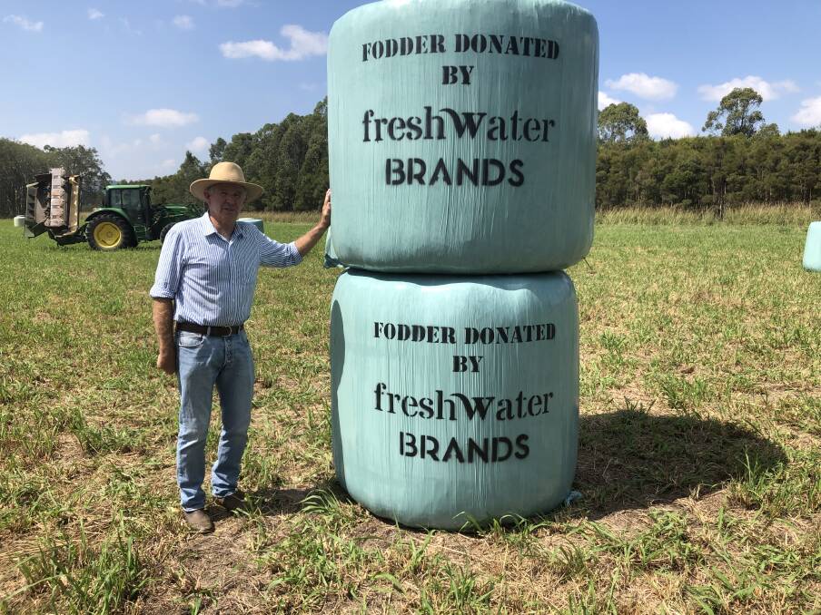 Allan Hutcherson from body health care company Freshwater Brands, who has donated 560 silage bales from Buladelah. Photo by Freshwater Brands.