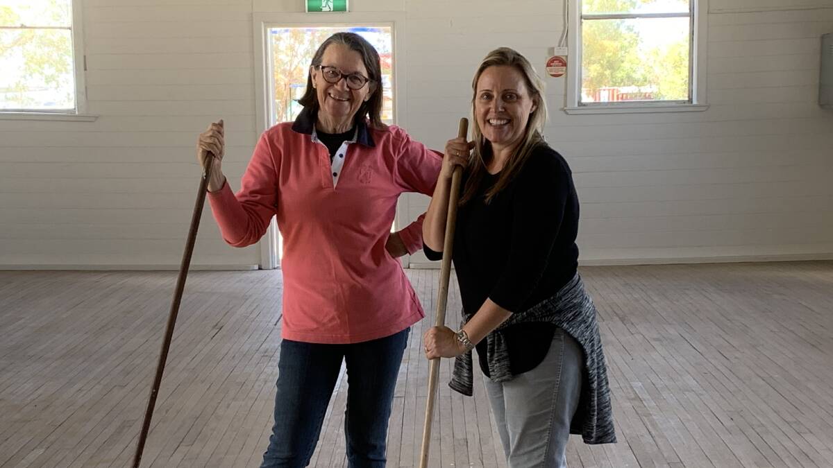 Coral Marshall and Suzie Moore were among many volunteers who helped to keep the doors open of the Burren Junction School of Arts Hall. Photo by Lucinda Stump.