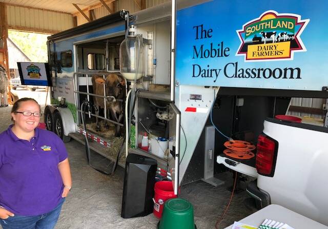 Four generation farmer Haley Fisher from the mobile dairy classroom.