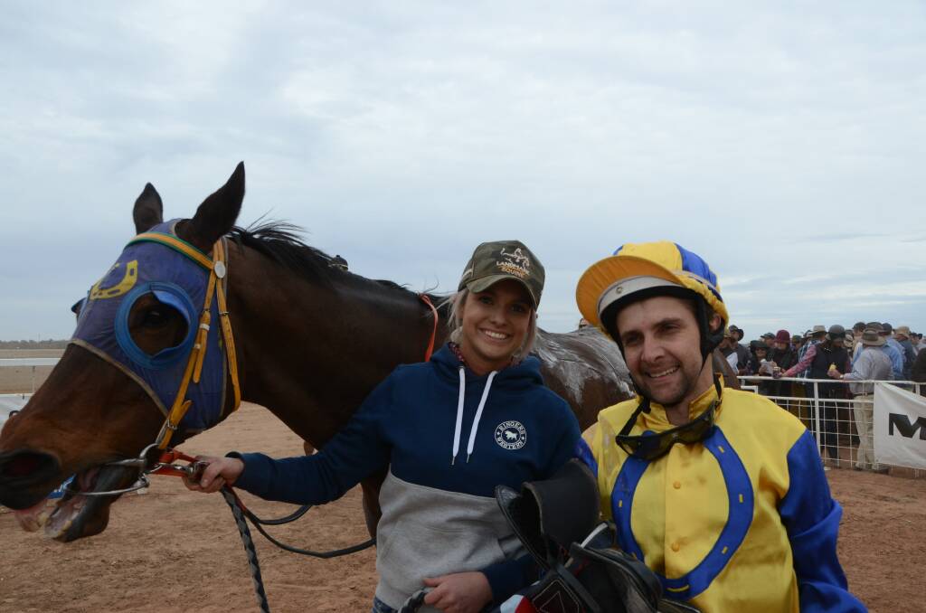 Nyngan trained Rusty Motorbike won his second Louth Cup seen here with excited strapper Katie Atherton and winning jockey Michael Hackett.