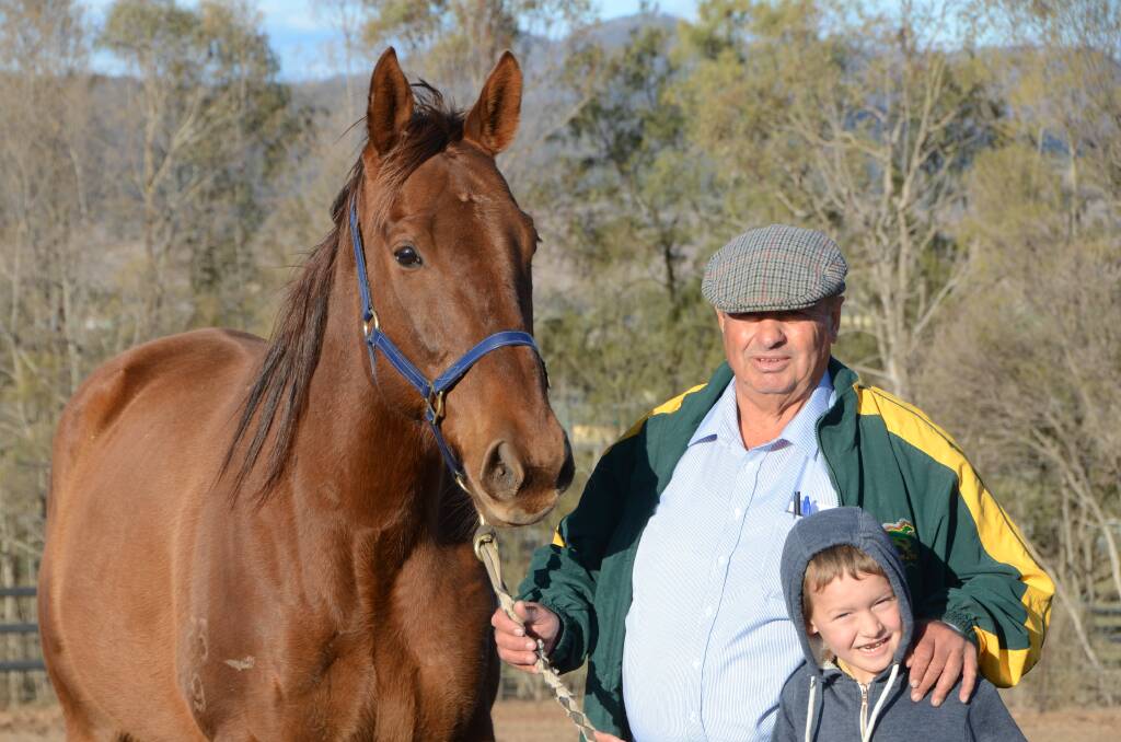 Able Friend in retirement with breeder Stuart Ramsey and his grandson Aston Coe at Turangga Farm near Scone.   