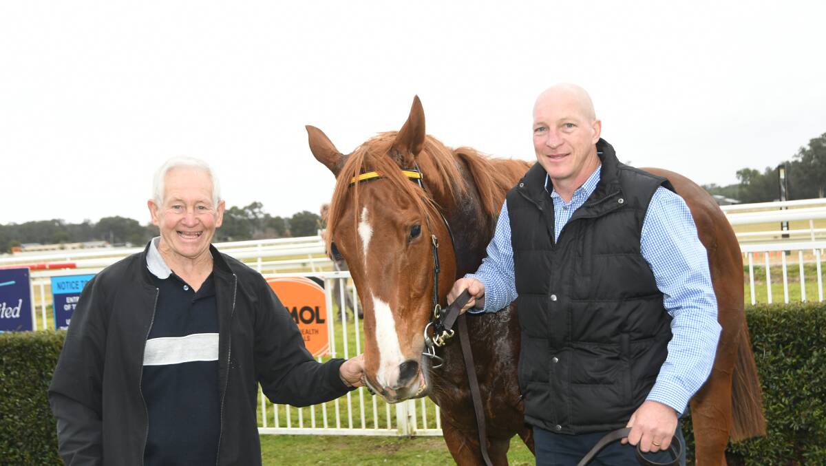 Local trainer Mike Van Gestal and son and strapper Paul with Charlie Chap who have had two recent wins at Hawkesbury. Photo Virginia Harvey 
