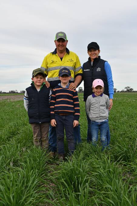 ATD Farming's Tom, Melissa, Max ,Georgie and Jack Greentree in one of the family's wheat crops near Mungindi. Photo: Billy Jupp 