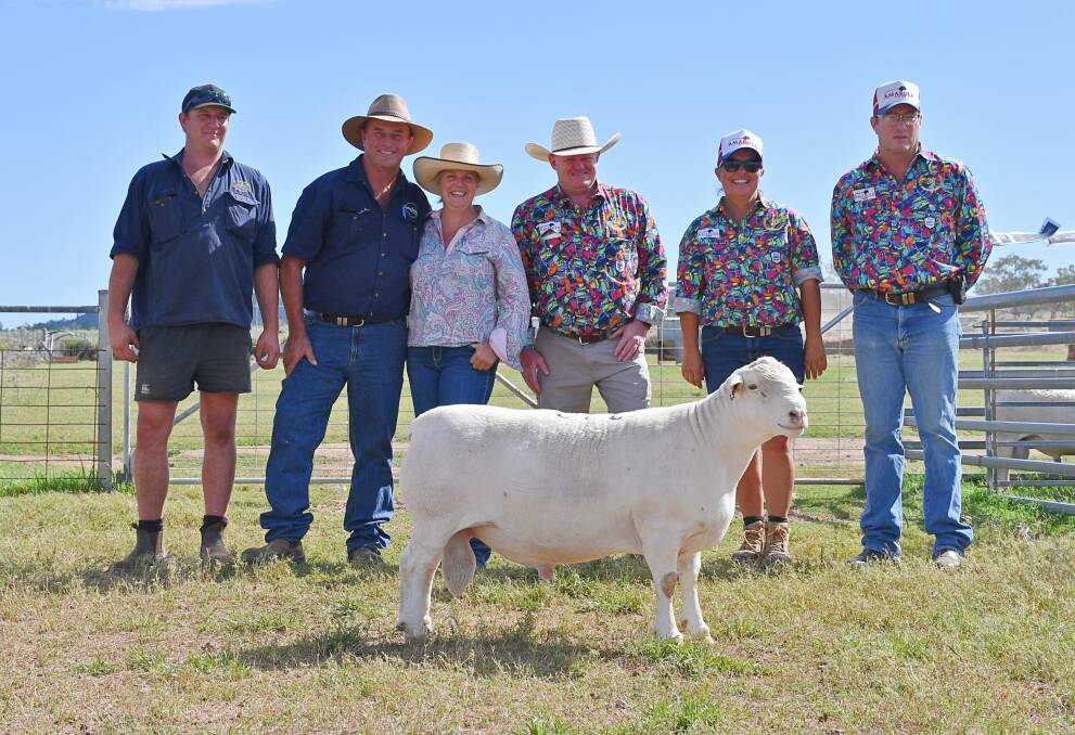 Buyers, Rob Edge, LEI Farming, Kevin and Narelle Spears, Dusty Downs, Hermidale, auctioneer John Settree and vendors Lorroi and Justin Kirkby, with the top-selling ram of Friday's sale. Picture by Billy Jupp