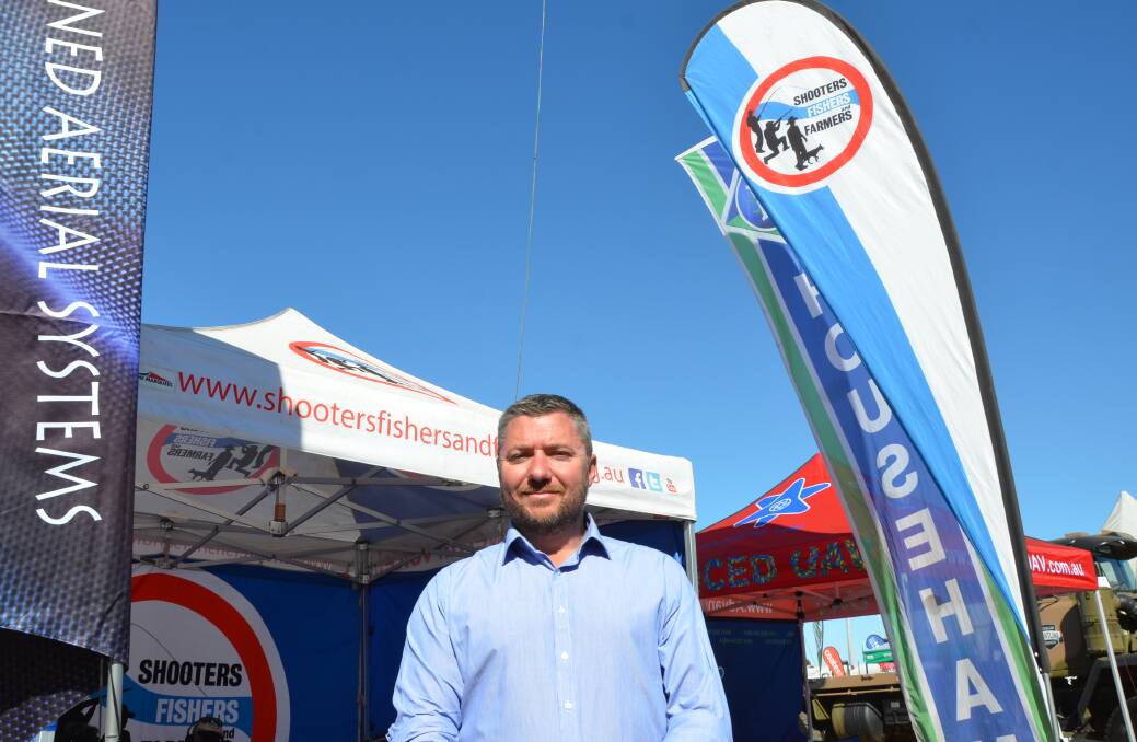 ON A ROLL: Tamworth Shooters, Fishers and Farmers candidate Jeff Bacon has been meeting visitors at AgQuip. Photo: Billy Jupp 