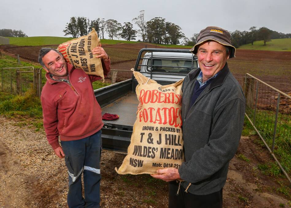 Tough going: Brothers Todd and Jon Hill from Hill Family Farming on their property. Photo: Wesley Lonergan