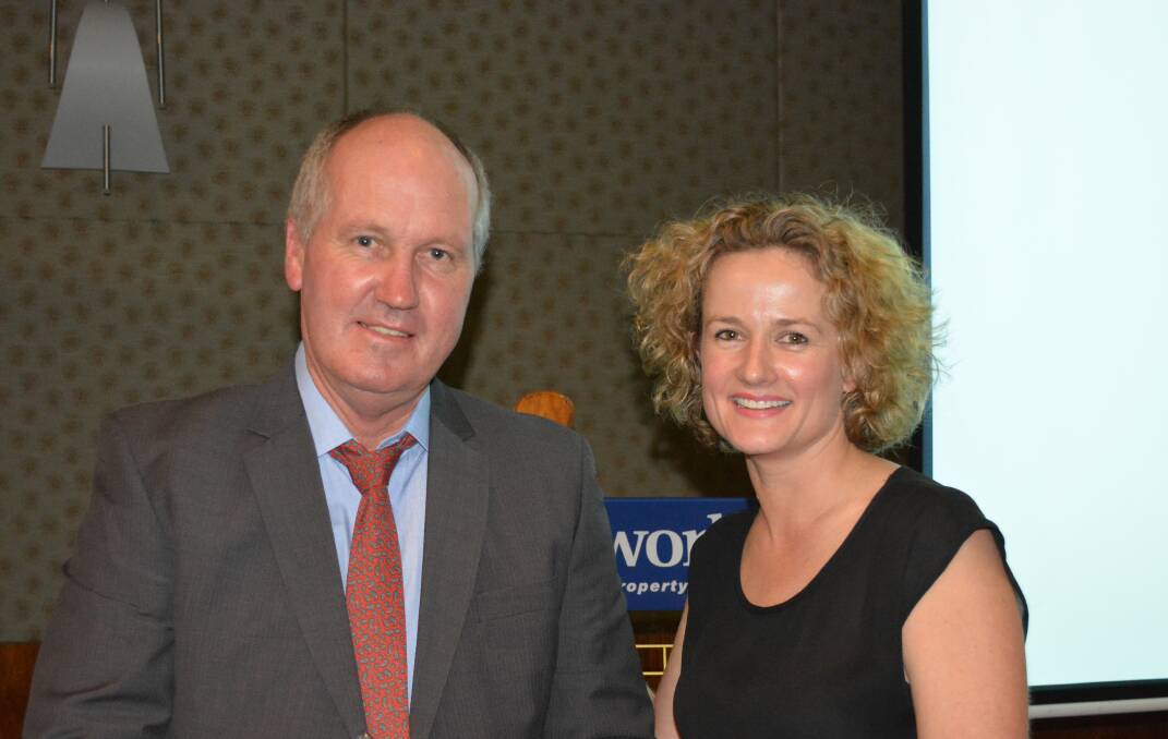 Mungindi agent Peter Prosser with AuctionsPlus chief executive officer Anna Speer.