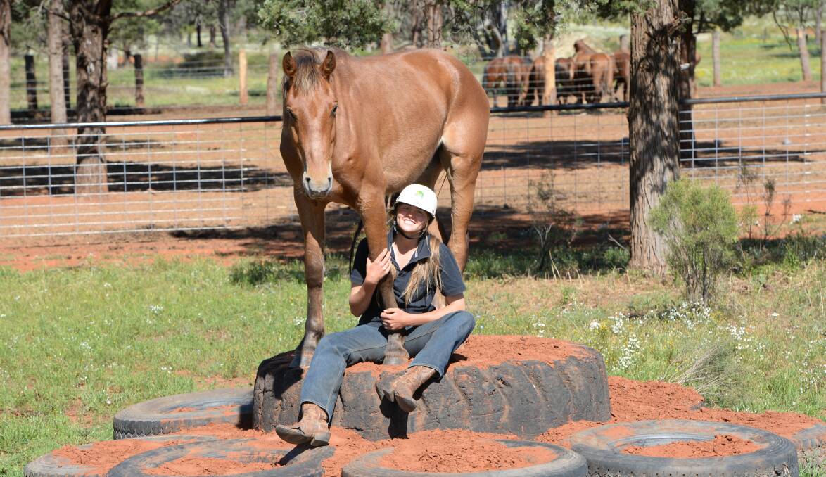 Lauren Hughes, 4BP Horses, "Belarabon", Cobar with brumby Lanky.