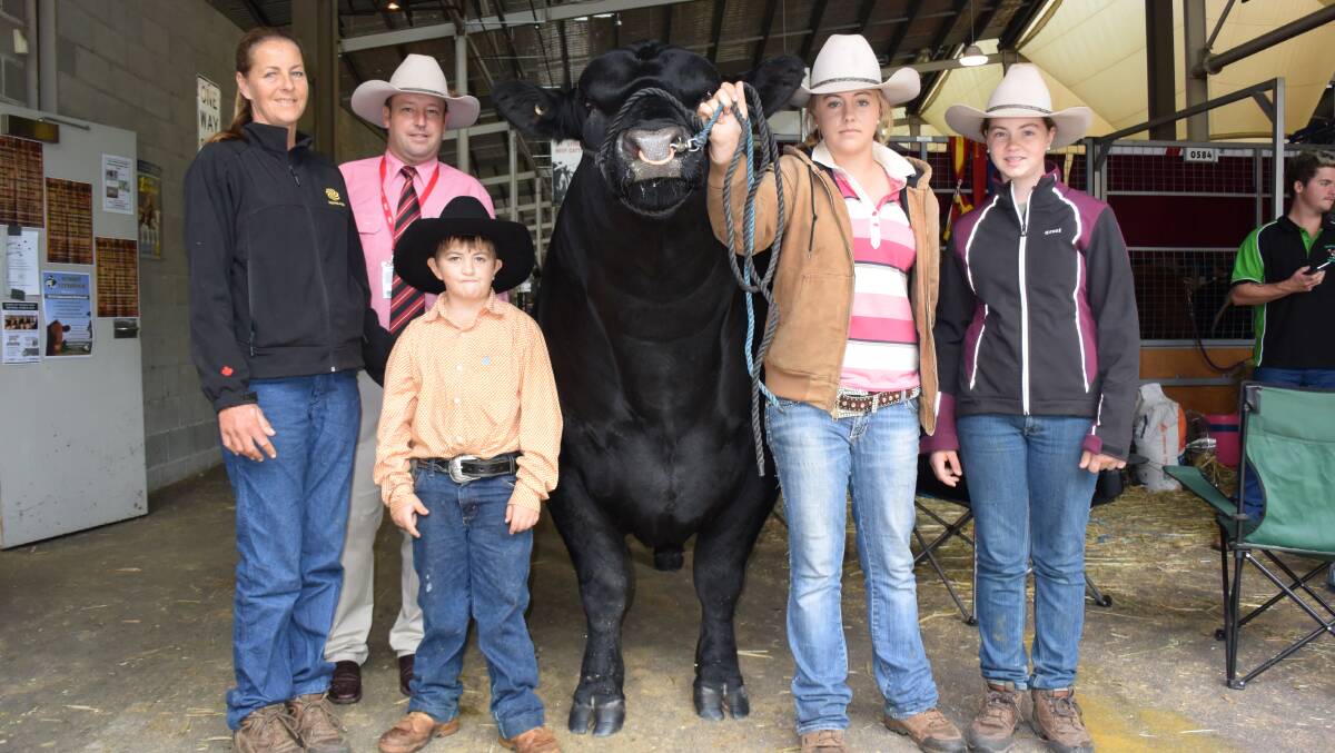 Josh Crosby, Elders stud stock, with Bronwyn, Josh, Sophie and Casey Halliday, J&C Angus, Wildes Meadow, and bull J&C Kingpin, who made $30,000 in 2016.