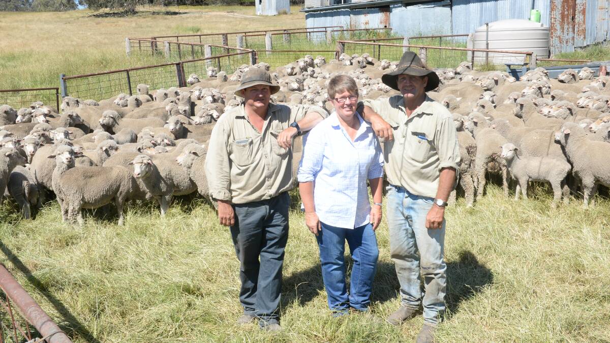 Stephen, Jenny and Barry Hoy with some of their Merino ewes and their September 2017-drop lambs at "Miltiades", Walcha. Photo by Rachael Webb