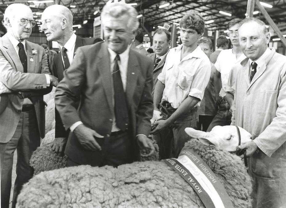 SHOW SUCCESS: Bob Hawke sashing a Cadell Border Leicester ram, exhibited by Ray Harper, at Sydney Royal in 1986.