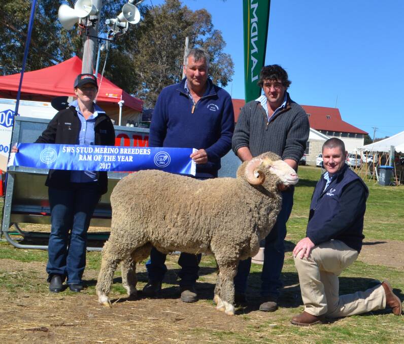 2017 RAM OF THE YEAR: Richard and Brad Chalker, Lach River Merinos, Cowra, had the top ram, pictured with sponsors, Deanne Madgwick, Bromar Engineering, Grenfell, and Trent Fordham, Riverina Wool Testers, Wagga Wagga. Photos: Stephen Burns