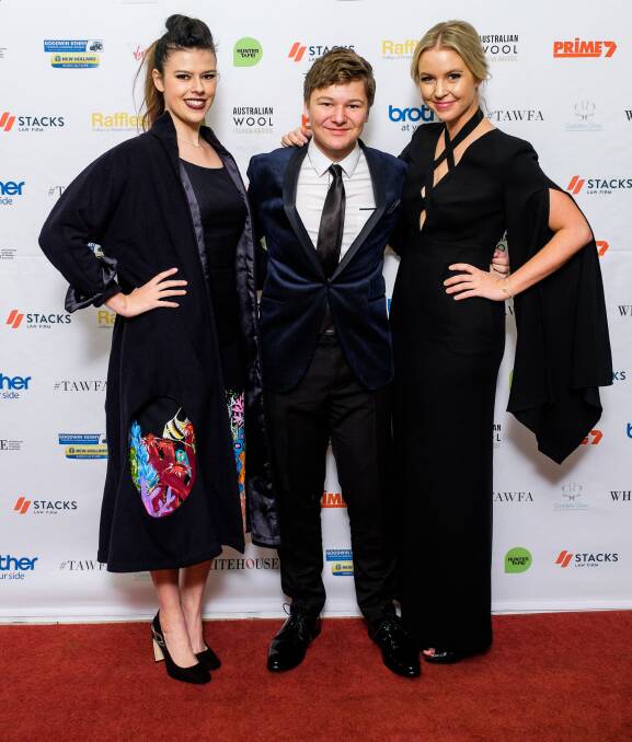 Model Lucy Burt, designer Connor O'Grady and guest judge, InStyle magazine editor Emily Taylor, at the wool fashion awards held at Tamworth in June.