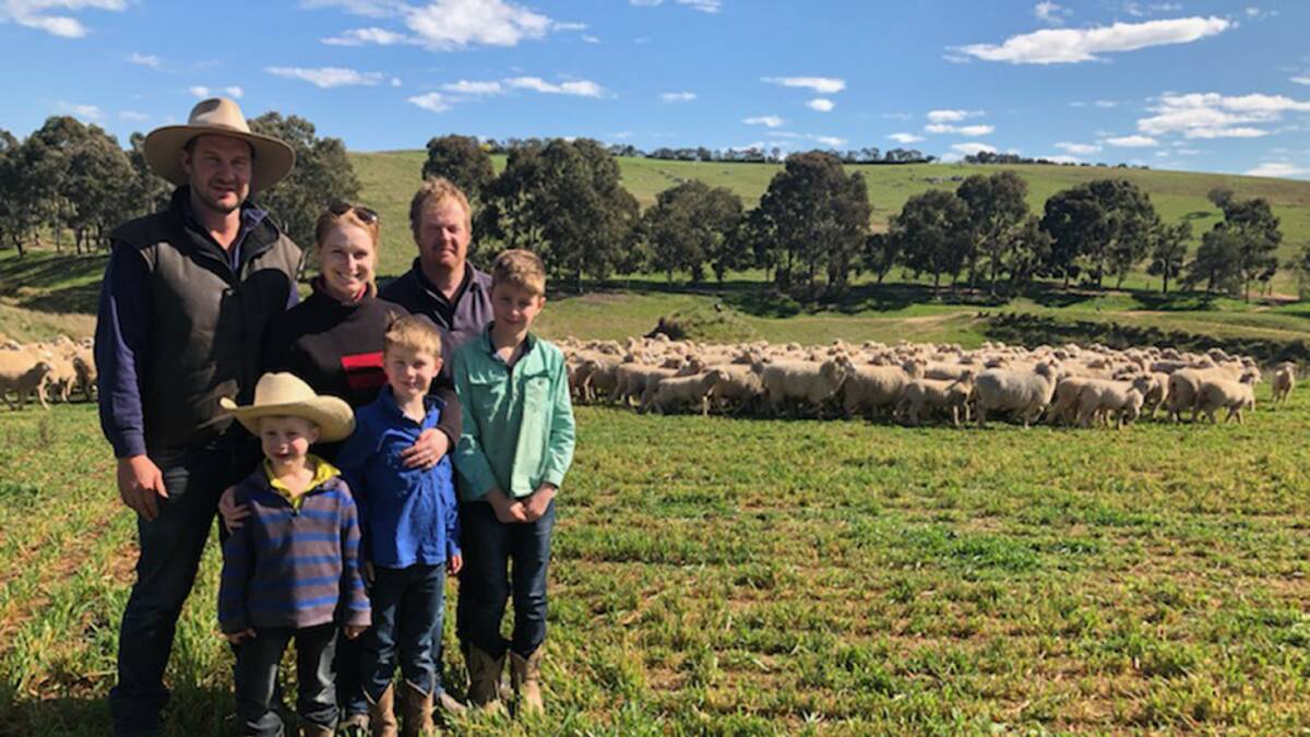 GOOD FERTILITY AND GROWTH: Dean and Kellie Howard and Matt Halloran, with Tom, Will and George Howard. The family runs a second-cross lamb production, breeding their own first-cross ewes.