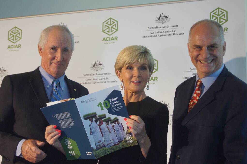 ACIAR Chair Don Heatley (left), Foreign Affairs Minister Julie Bishop and ACIAR CEO Andrew Campbell.
