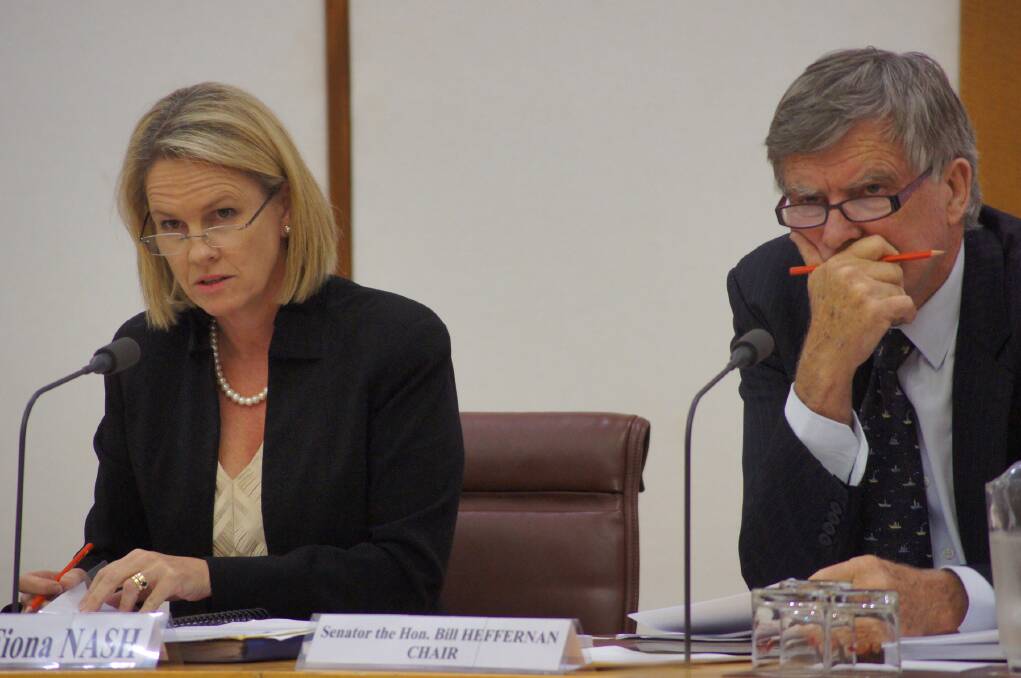 Former Senators Fiona Nash and Bill Heffernan interrogating ADM executives at a Senate inquiry hearing in Canberra, in 2013.