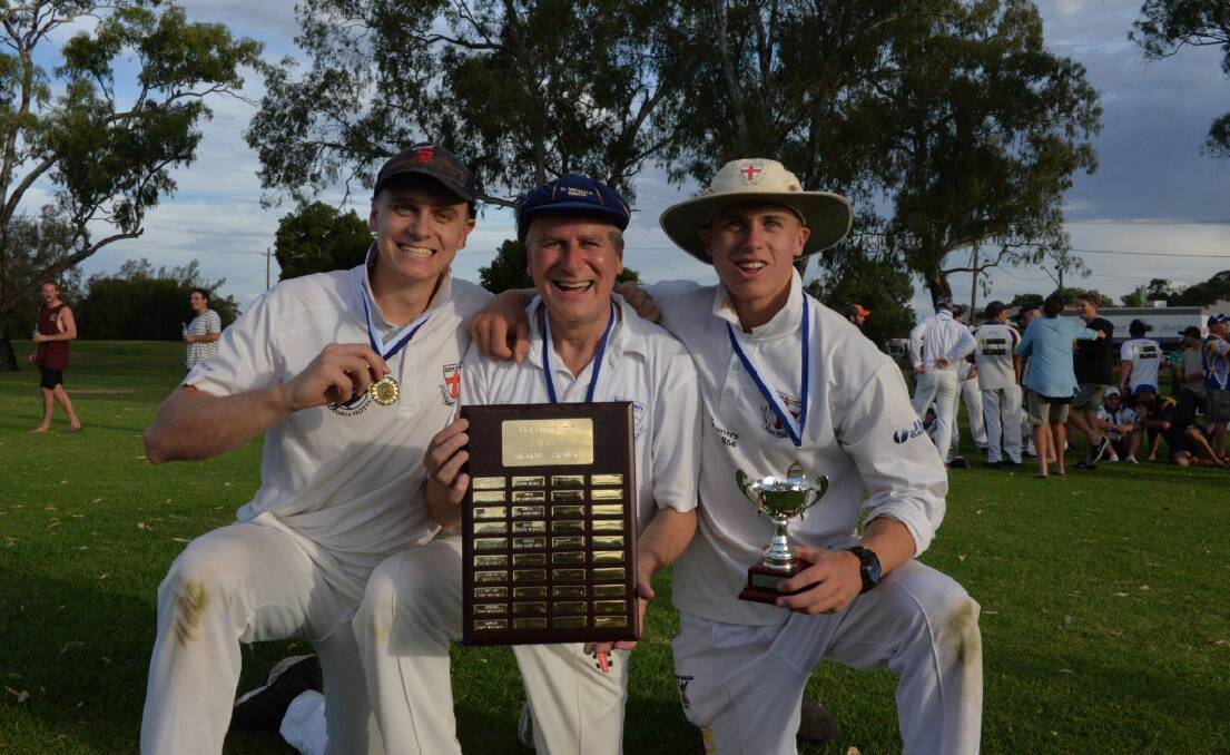 Nationals leader and Deputy Prime Minister Michael McCormack (centre) with his sons Alexander (left) and Nicholas with the Wagga Cricket fourth grade premiership shield after Saturday's grand final win.