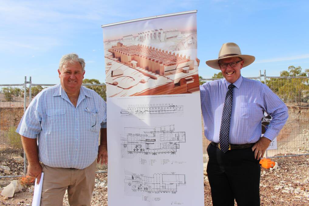Australian Opal Centre president, David Lane OAM and Member for Parkes, Mark Coulton with the plans for the proposed opal centre at Lightning Ridge, a vision for close to two decades now becoming a reality.