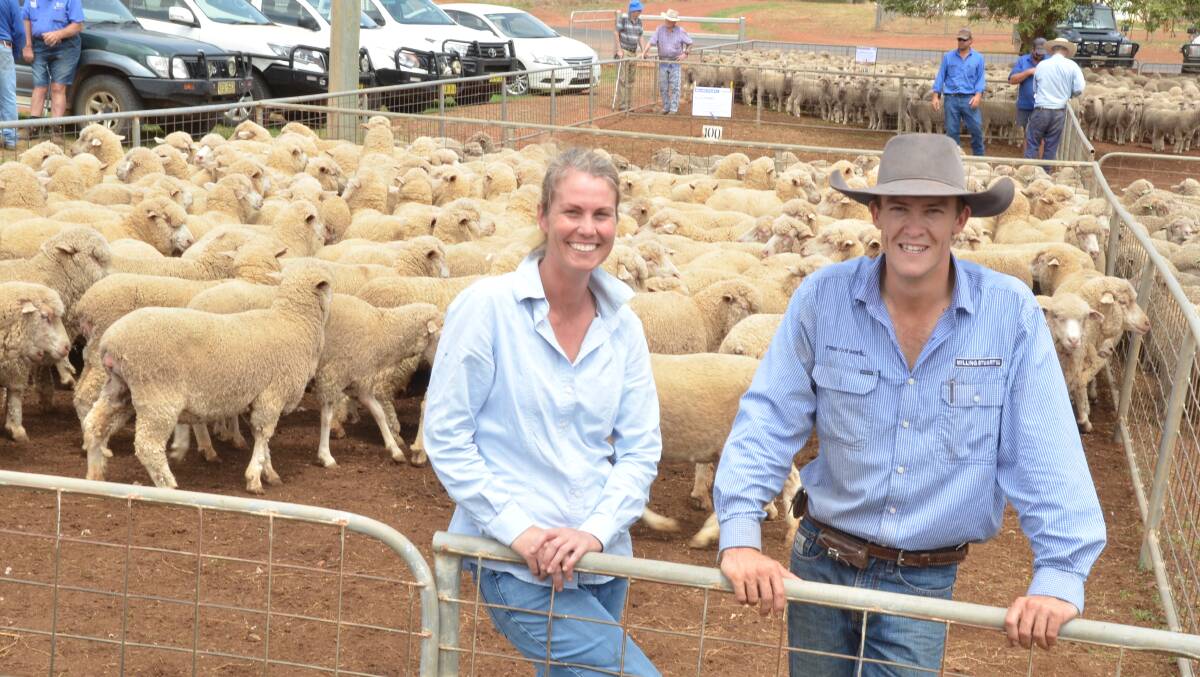 For the third or fourth consecutive year Alison Kensit, Redbank Park, Dunedoo, gained the top merino ewe price, this year at $265 each for 129 Cassilis Park blood 2 1/2yr scanned 123 per cent in lamb to New Armatree blood Border Leicester rams when bought by next-door neighbour, Gary Nott, Minemoorong, Dunedoo. Alison is pictured with Milling Stuart agent Lachlan Croake.