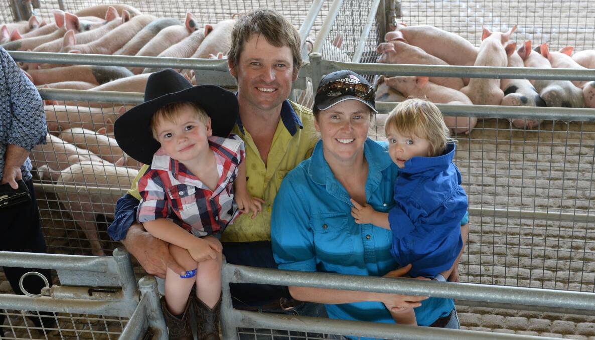 Mitch and Angela Ridley, "Mogong Valley", Bogan Gate with Bae, 3 and Levi, 1, sold a pen of 31 weaners at $119 a head in a cheaper market.