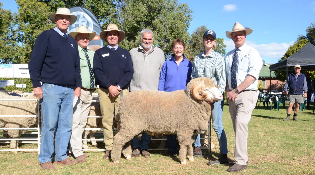 The $9000 ram with Haddon Rig classer Andy McLeod, John Settree, Landmark, Dubbo; Andy Maclean, HR manager; buyers Tony and Rhonda Milgate, "Rockvale" Trundle; Olivia and George Falkiner of Haddon Rig.