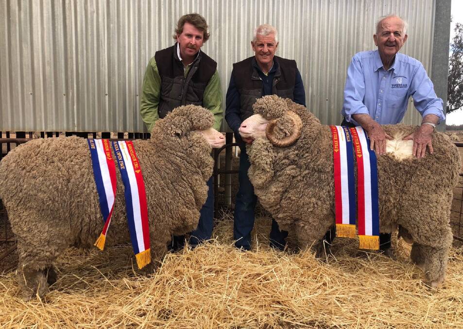 Mitch Cook, Towalba Merinos, Peak Hill, with Warick and Neville Kopp, owners of Towalba, and their grand champion ewe and ram of the 2019 Peak Hill Show.