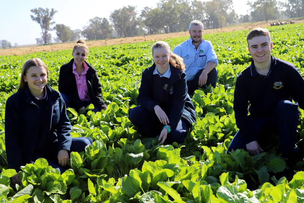 Students Madison Hourigan, Amelia Murray and Thomas Eason with Teresa Standing, Gilgandra High School agriculture teacher, and Martin Murray, AMPS Commercial agronomist, Armatree. Photo. Gabrielle Johnston.