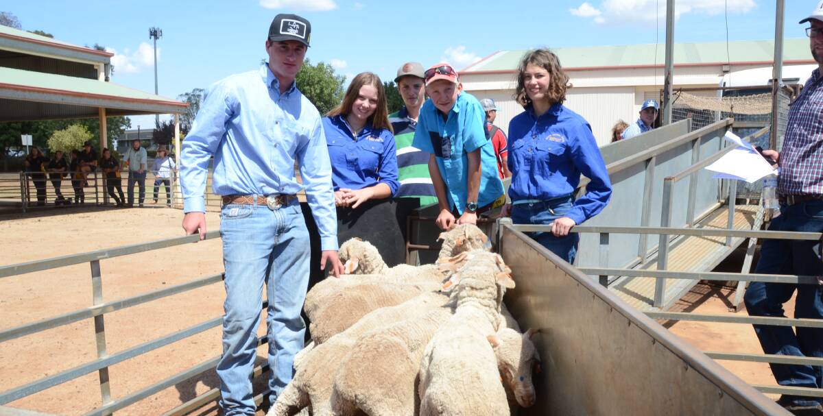 Guyra Central School agriculture students Myles Williams, Rhylee Adams, Andrew Pearson, Brendon Williams and Kelly Daley about to load their wethers.