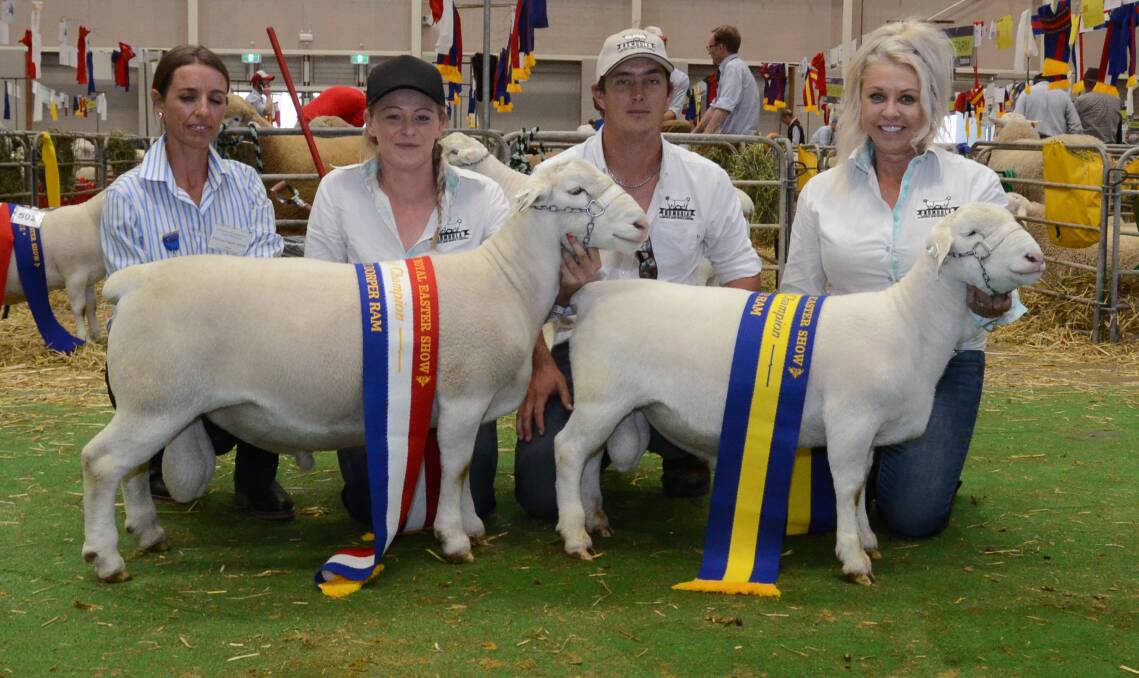 Judge, Mel Pagett, Winrae stud, with Nomuulas grand and reserve champion White Dorper rams held by Joanna Dixon, David Sandell and Cherilyn Lowe, Moombi.