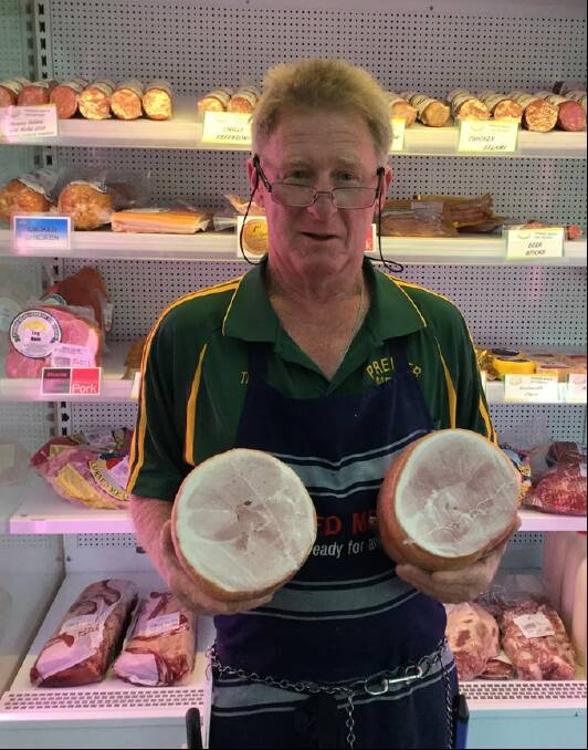 Tim Rose of Premier Meats, Tenterfield, displays his winning boneless hams.