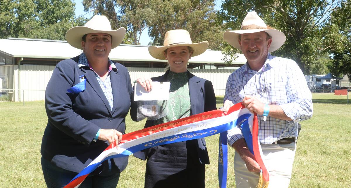 Overjudge Renae Keith of Allenae Angus and Poll Hereford studs, Roslyn, with champion junior judge Ruby Canning, Armidale, and head of the section Stuart Glover, Moss Vale.