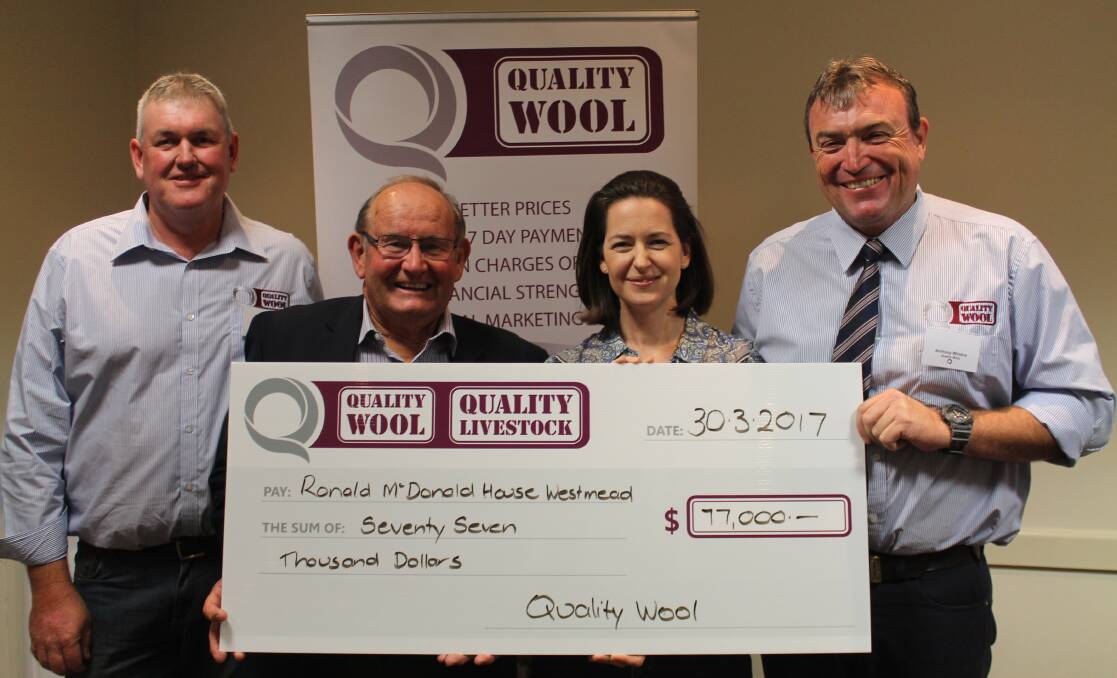Quality Wool's NSW Operations Manager, Chris Scott, Parkes, presents the cheque to Ray Finn and Belinda Woolford, Ronald McDonald House Westmead, with Quality Wool's area manager, Anthony Windus.