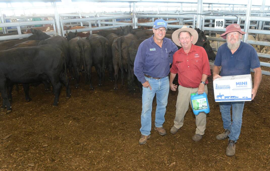 Best presented pen of cows with calves were awarded Beechport Liquid Mineral packs.Pictured ois David Amor of Beechport and auctioneer Tim Mackay, Forbes Livestock and Agency with breeder Dick Hawken, Thurlstone, Cookamidgera. The 14 cow/calf units - Noonee blood Angus/Santa Gertrudis cross cows 4-7 years, with Charolais calves made $3140.