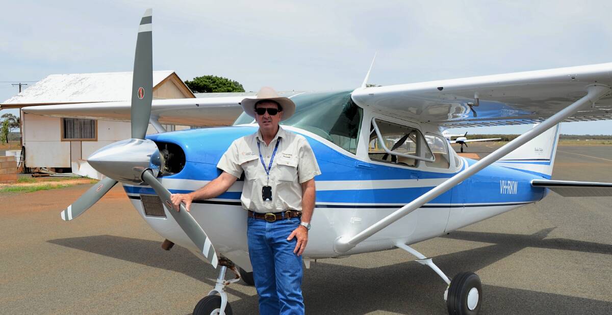 David Russell with his rebuilt Cessna 182 in which he flies just about everywhere from home at Budda Station, Tilpa.