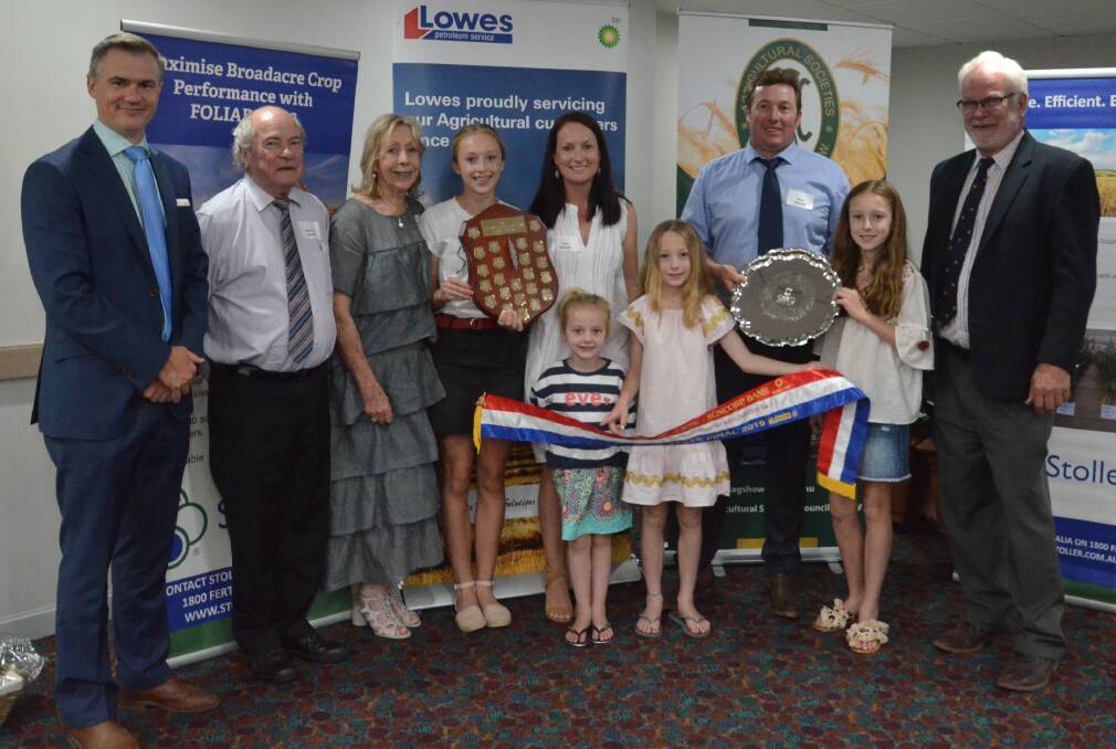 Ben Graystone, Suncorp Bank northern NSW manager, Orange, with state champions, the McLeod family, Thornleigh, Wallendbeen, Malcolm, Diana, Claudia 15, Julia, Estee 5, Sacha, 9, Scott and Lily, 12, with ASCs Tim OBrien, Goonumbla.